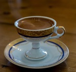 An espresso in a delicate Italian cup